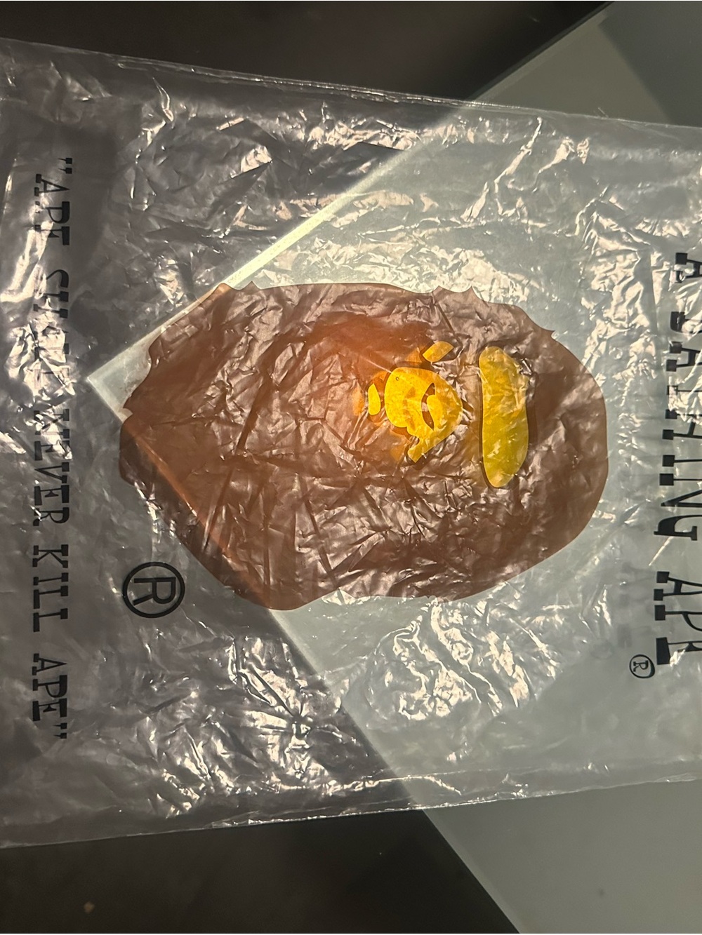 Bape Brown Tee with Yellow Ape-Head Graphic